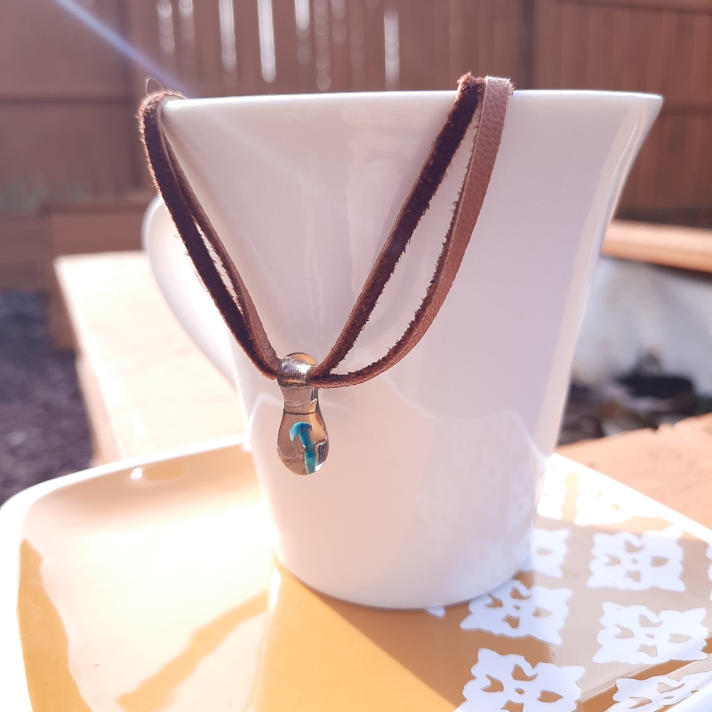 Clear Gray Glass W/Blue Inclusion Necklace